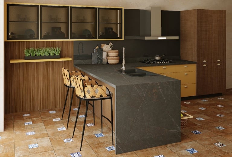 Modern kitchen interior with dark gray island counter, bar seating, wood cabinetry, and tiled flooring